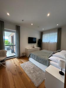 Posteľ alebo postele v izbe v ubytovaní Traumhaus in den Weinbergen - max 8 Personen - mit Self-Check-in + 37 fotografií