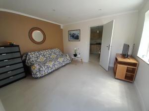 O zonă de relaxare la Maison à cinq min de la mer, à louer à la semaine, du 19 au 26 juillet 25