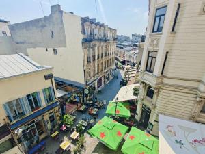 an overhead view of a city street with buildings at Old Town Cozy Suites Smârdan - Pumo Properties in Bucharest