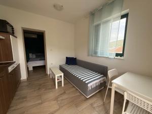 Postel nebo postele na pokoji v ubytování Apartments Moreno - Pannonia