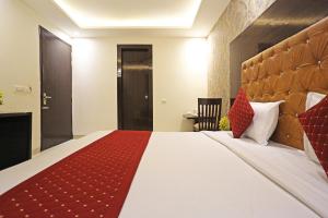 Voodi või voodid majutusasutuse P S Grand By Iconic Near Delhi International Airport toas