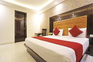 Voodi või voodid majutusasutuse P S Grand By Iconic Near Delhi International Airport toas