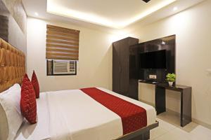 Voodi või voodid majutusasutuse P S Grand By Iconic Near Delhi International Airport toas