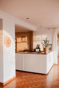 a kitchen with a counter and a counter top at Blue Kaouki in Sidi Kaouki