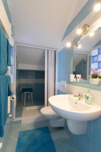 Koupelna v ubytování BellaVista B&B + 25 fotografií