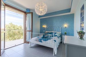 Postel nebo postele na pokoji v ubytování BellaVista B&B