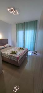 Postel nebo postele na pokoji v ubytování Villa Grafenberg Ulcinj
