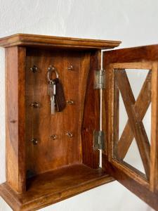 a wooden box with a pair of keys in it at Maruan Heaven in Marvão +80 photos