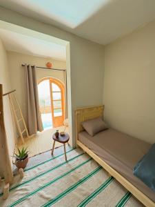 Postel nebo postele na pokoji v ubytování Taghazout Surf Villa - All-Inclusive