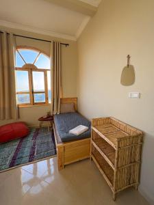 Postel nebo postele na pokoji v ubytování Taghazout Surf Villa - All-Inclusive