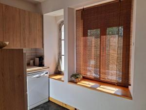 Kuchyň nebo kuchyňský kout v ubytování FANTASTICO - 70m - REFORMADO- VISTAS A LA MONTAÑA - Wifi - Acceso Trastero junto a Parking + 21 fotografií