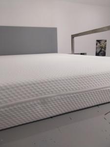 a mattress laying on the floor in a room at Studio avec terrasse indépendant en villa in La Garde