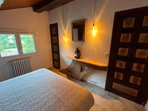 Ένα ή περισσότερα κρεβάτια σε δωμάτιο στο Chalet Airaudi