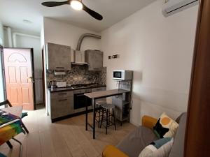 Kuchyň nebo kuchyňský kout v ubytování Archubintu B&B + 30 fotografií