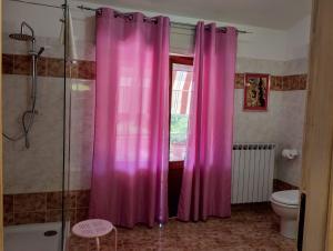 Koupelna v ubytování FalcoBianco GuestHouse
