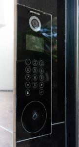 a picture of a remote control in a box at Hotel Rooms St Paul in Plovdiv
