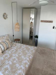 Voodi või voodid majutusasutuse Luquillo Beach & Ocean Breeze toas