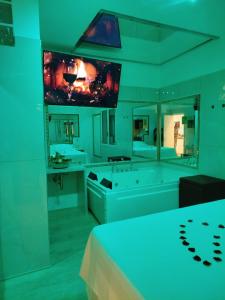 A bed or beds in a room at Confort Suites