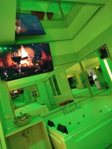 A television and/or entertainment centre at Confort Suites
