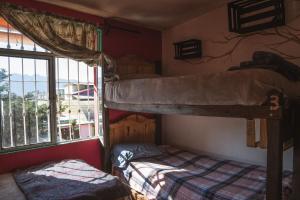 Postel nebo postele na pokoji v ubytování Historika Hostel Cultural
