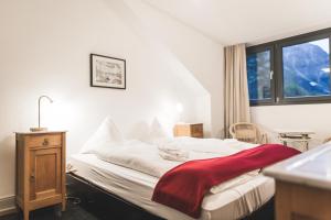 Voodi või voodid majutusasutuse Kurhaus Bergün toas
