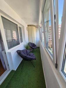 Posezení v ubytování Apartament Compozitori cu parcare și balcon