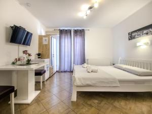 Postel nebo postele na pokoji v ubytování Guest House Mačić