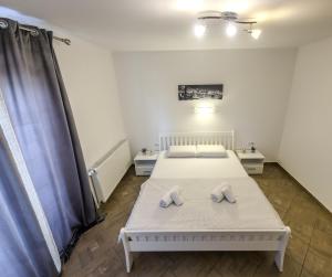 Postel nebo postele na pokoji v ubytování Guest House Mačić