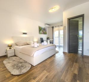 Postel nebo postele na pokoji v ubytování Guest House Mačić