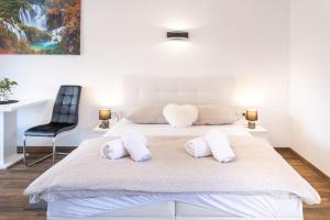 Postel nebo postele na pokoji v ubytování Guest House Mačić
