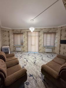 Posezení v ubytování Oʻzbegim + 1 fotografie