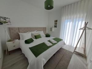 Letto o letti in una camera di ArouceHostel