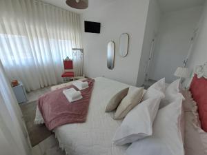 Letto o letti in una camera di ArouceHostel