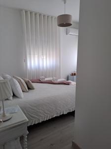 Letto o letti in una camera di ArouceHostel