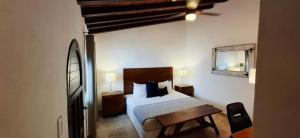 Postel nebo postele na pokoji v ubytování Hotel Suites Mar Elena