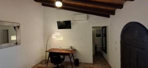 TV a/nebo společenská místnost v ubytování Hotel Suites Mar Elena