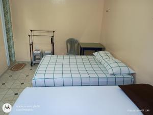 Apartamentos no Farol Velho 객실 침대