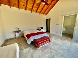 Ένα ή περισσότερα κρεβάτια σε δωμάτιο στο Complejo casa grande y dos lofts en Traslasierra