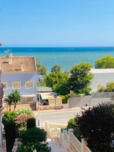 a view of the ocean from a building at Seaview Apartman Santa Pola in Santa Pola