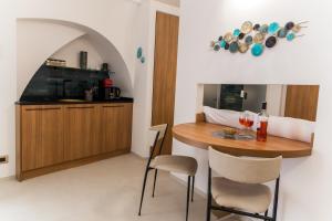 Kuchyň nebo kuchyňský kout v ubytování Madia's House by MONHOLIDAY