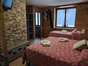 Katil atau katil-katil dalam bilik di Hotel Piccolo Parco