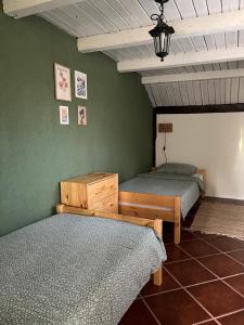 Voodi või voodid majutusasutuse Vila Timok toas