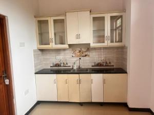 Kuchyň nebo kuchyňský kout v ubytování Grand Residence
