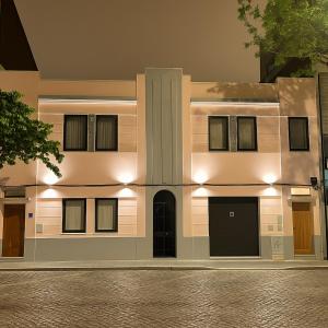 a building with lights on the side of it at MyTrip Porto in Matosinhos