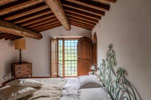 Ένα ή περισσότερα κρεβάτια σε δωμάτιο στο Charming&Luxury Villa near Assisi, Service Experience Exclusive