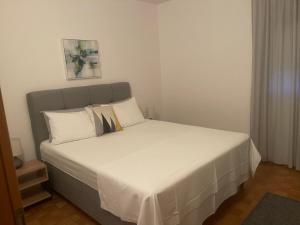 Postel nebo postele na pokoji v ubytování Villa Dijana