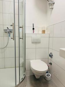 Ένα μπάνιο στο Am Geeste Apartment Ihr gemütliches Zuhause auf Zeit in Bremerhaven