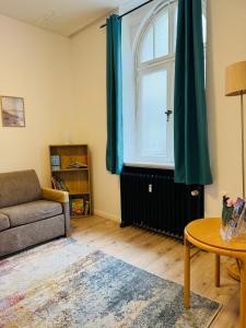 Χώρος καθιστικού στο Am Geeste Apartment Ihr gemütliches Zuhause auf Zeit in Bremerhaven