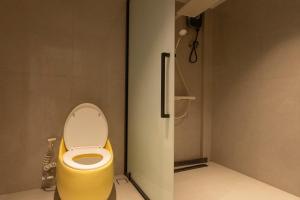 Vannituba majutusasutuses YUSU Hotel 羽宿酒店