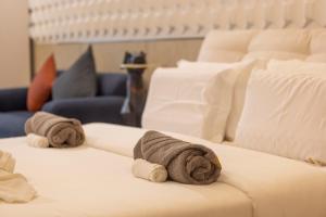 Voodi või voodid majutusasutuse YUSU Hotel 羽宿酒店 toas